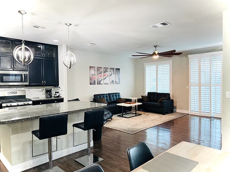 Living room, dining room, balcony, and entrance for a large OPEN FEEL