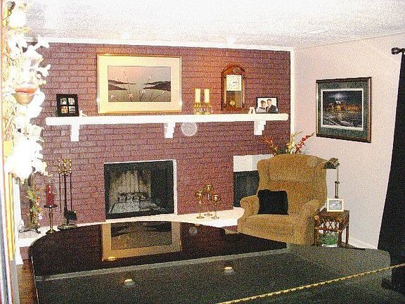 Living room with wood burning FP....