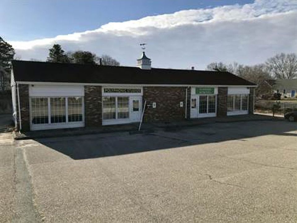 Front with large parking lot