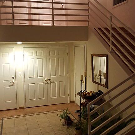 Foyer to garage and master 