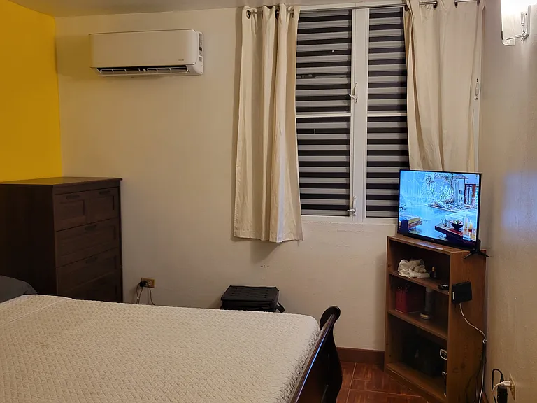 2nd Bedroom with AC, TV and storage