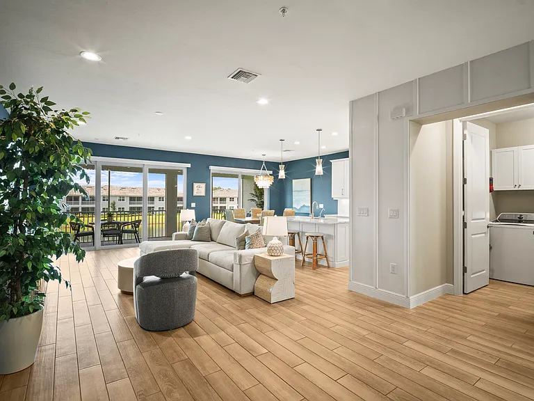 Open area into laundry room, storage