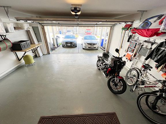 two car garage and parking space on the driveway