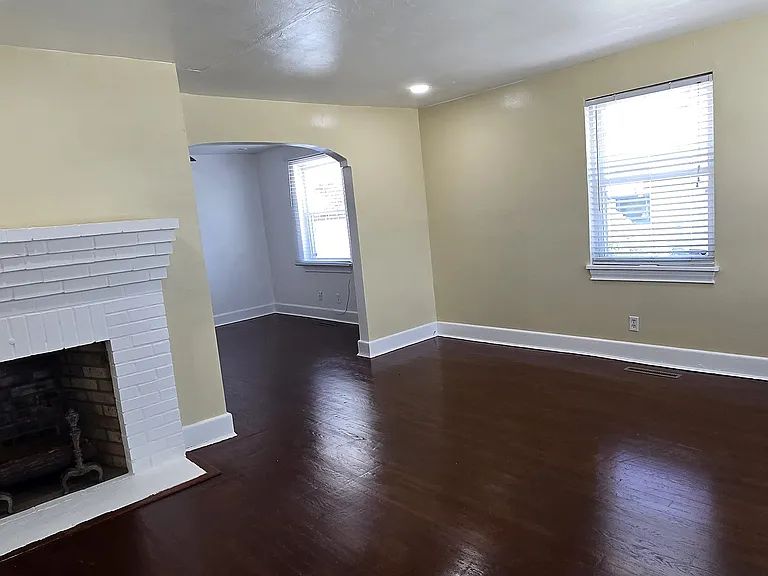Living rm - Fireplace, hardwood floors, recess lighting.