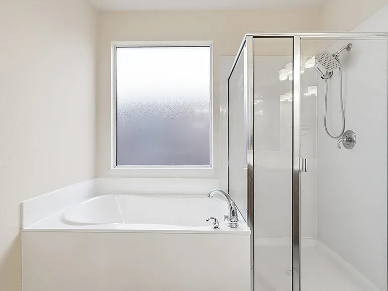 A close up of the bathtub