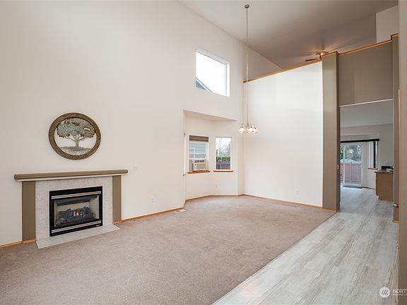 Living and dining rooms have 2-story ceiling>