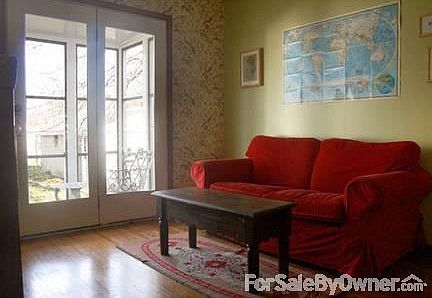 Lovely french doors open to the porch