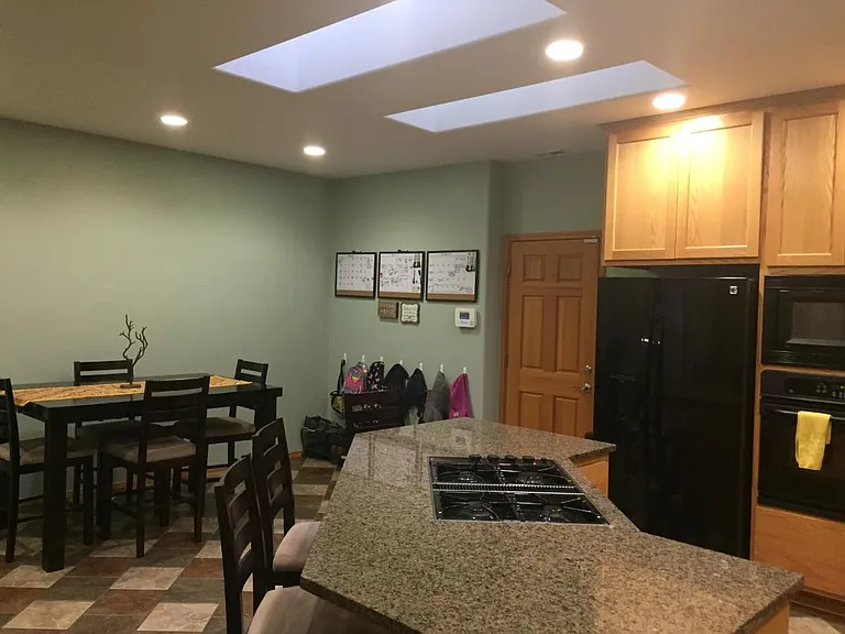 Skylights. Matching appliances. Garage entry and large din