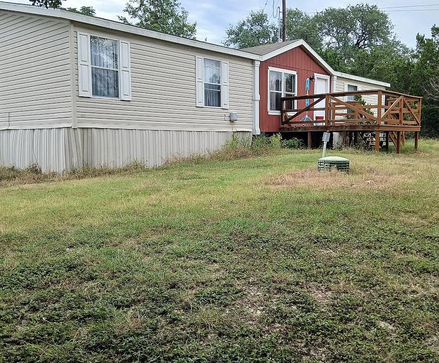 Front of house With full deck.
