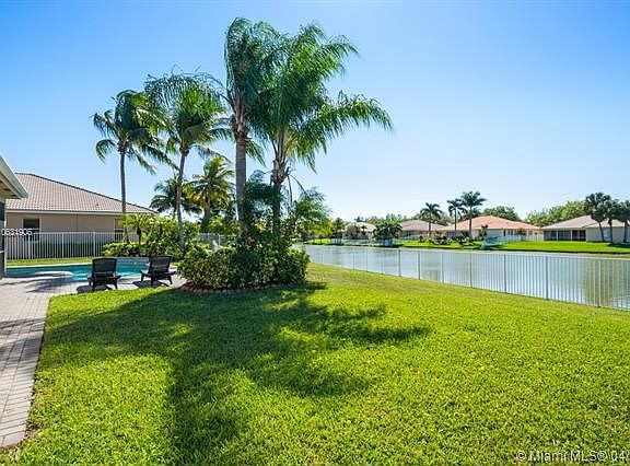 Premium oversized lot with large lawn area.  Fully fenced also with uninterrupted lake views to the south.
