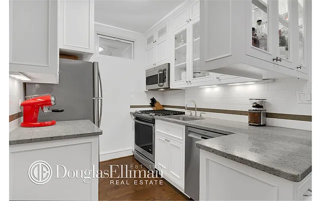 Sold by Douglas Elliman | media 13