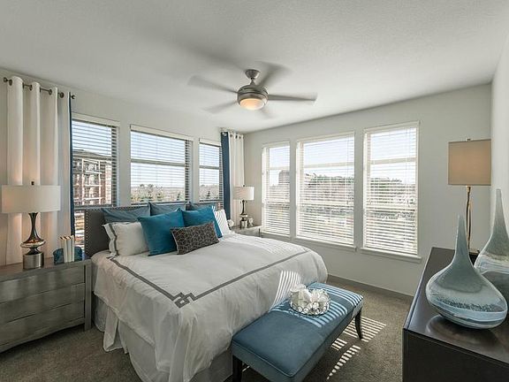 Similar to master sans windows behind bed.