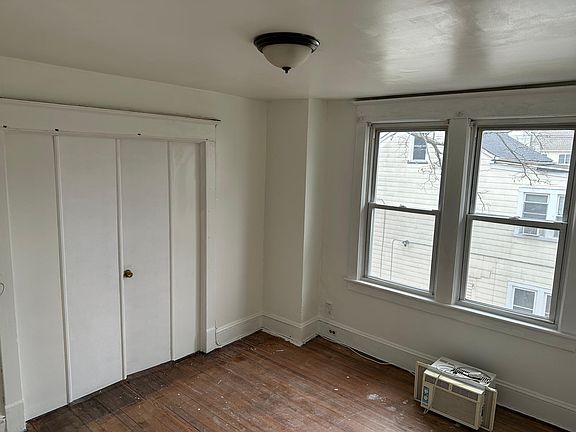 Living room pic 3 with door to large bedroom