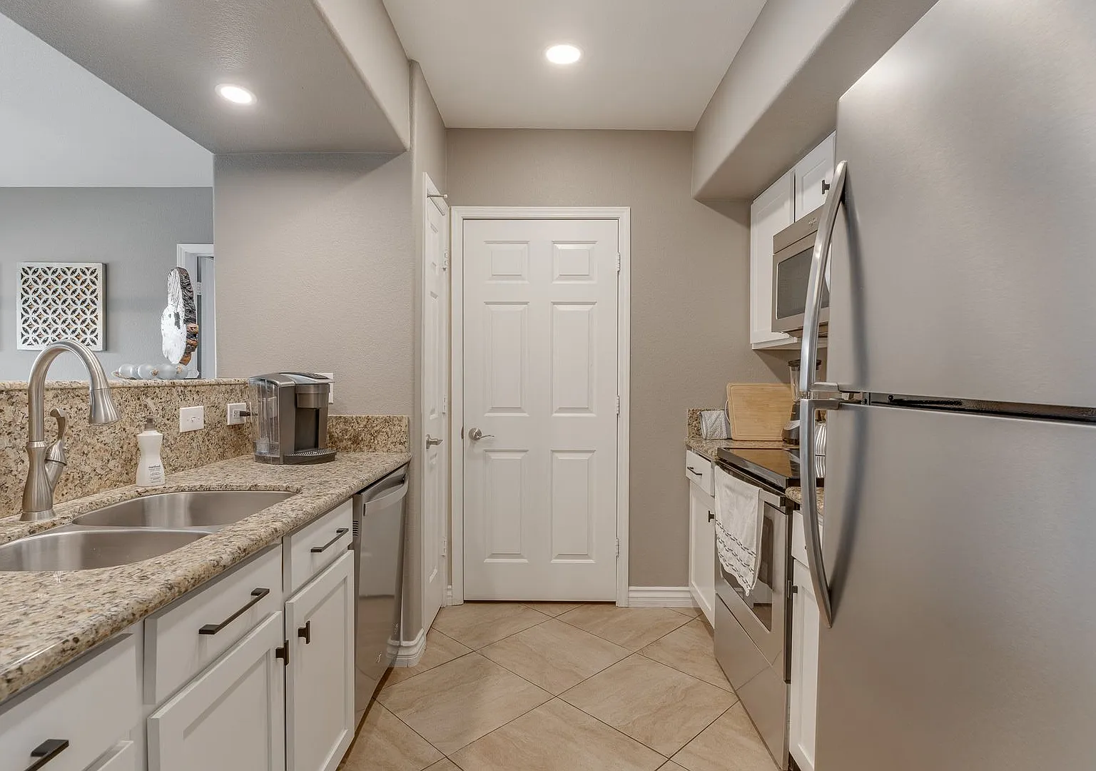 Bright & Airy 2-Bedroom Condo with Dual Suites & Private Patio! — Photo 3