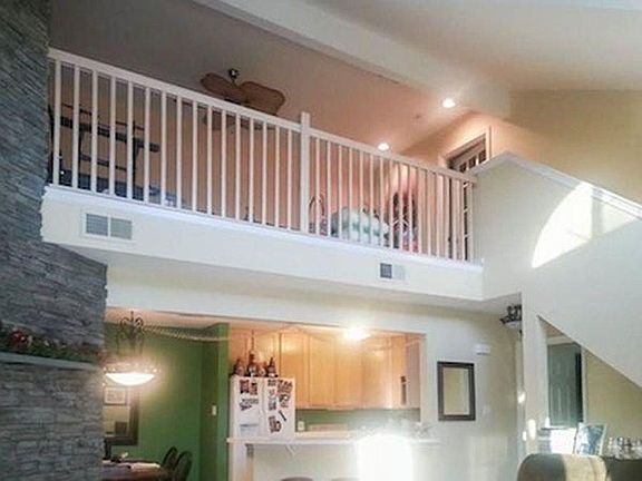 Open concept living area view of loft