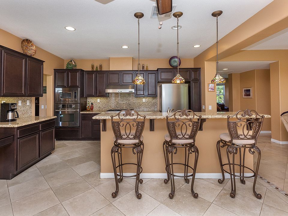Dark Wood Cabinets & Granite