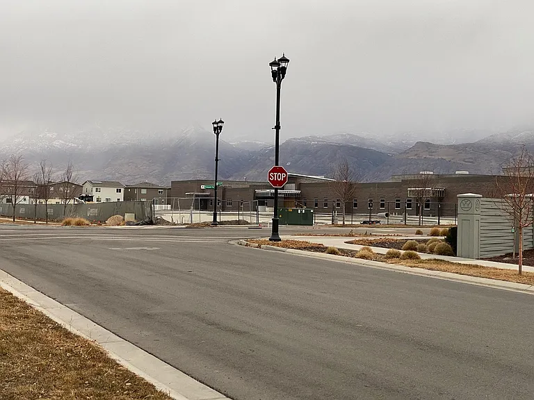 Elementary school behind and across the street from the home.