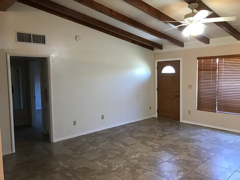Ceiling fans are installed in all rooms.