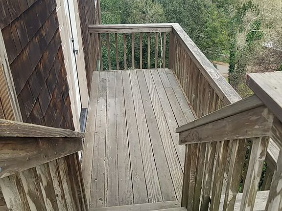 Stairway to front deck and unit.