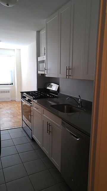 2nd image of 9801 67th Ave APT 14F