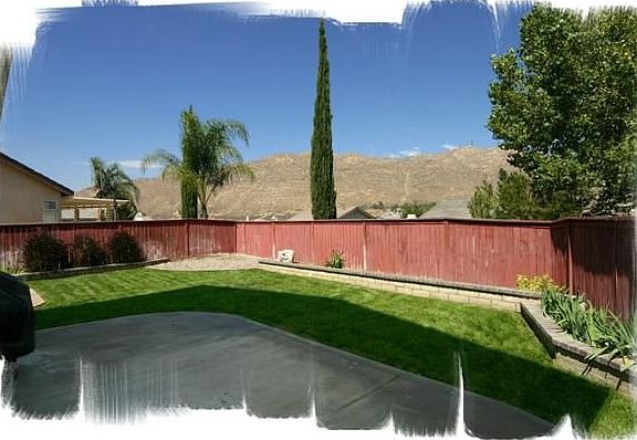 Expanisve Backyard with Box Spring Mountain Backdrop