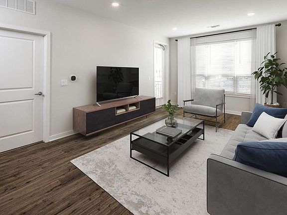 Coming Soon - New West Phase apartments - Finish Package IV Living area with hard surface flooring throughout (Representative photo)