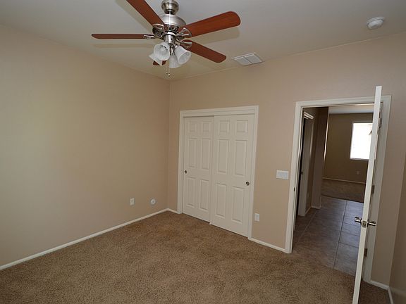 5th image of 10439 S Cutting Horse Dr