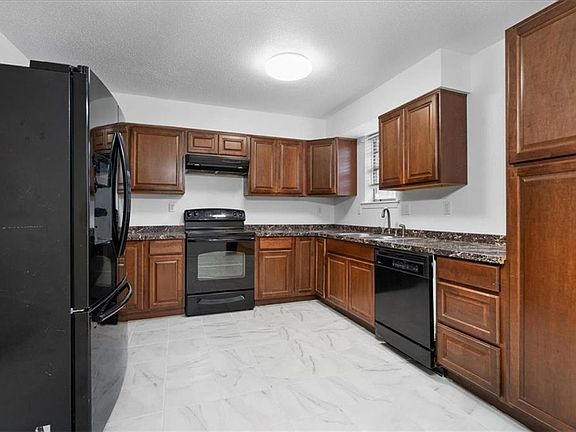 5th image of 5068 Towering Oaks Ave