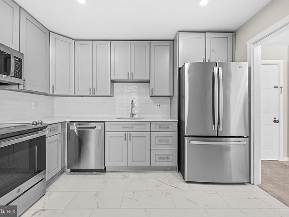 4th image of 11400 Strand Dr APT 201