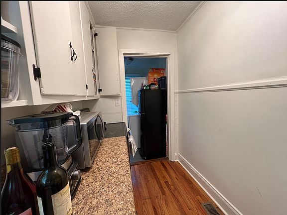 Kitchen and laundry/mud room.