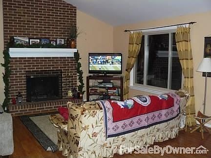 family room
						:
						large family room with wood stove and excess to deck and fenced in yard