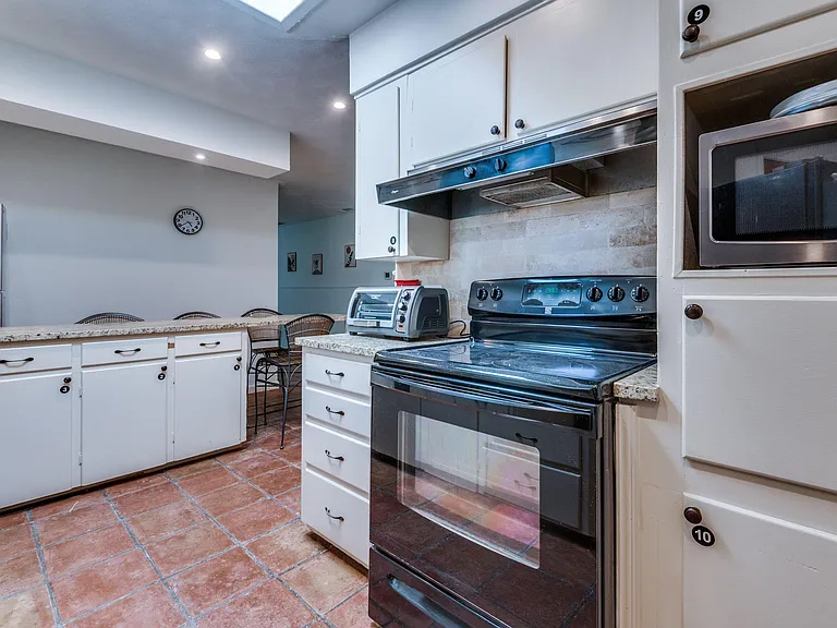 Labeled kitchen cabinets for easy, harmonious living