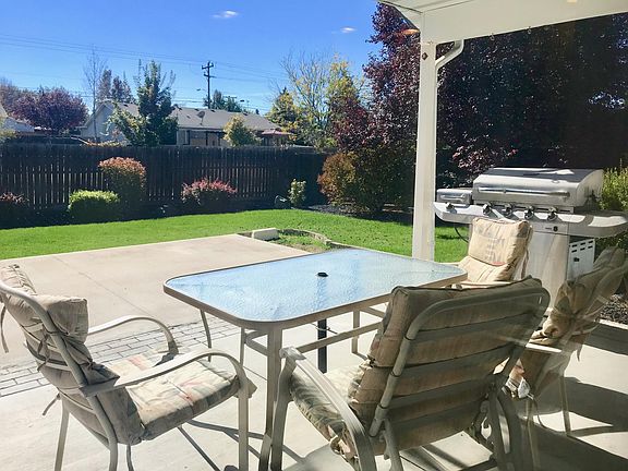 Patio, only half visible. There is this much more on the side of the house. Great for entertaining and watching the sunset.