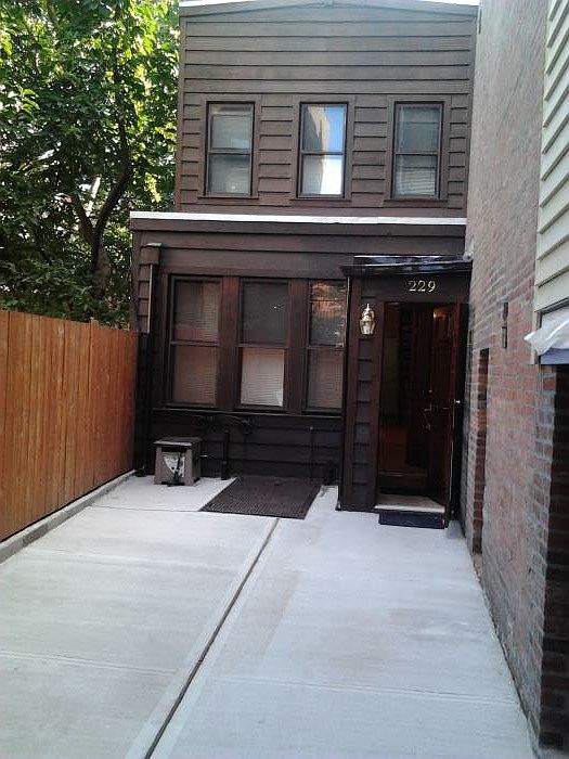 Front of House and 40 Ft. Paved Yard