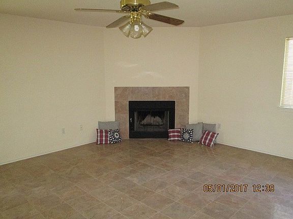 Family room... for all to gather.  Hard tile for easy maintenance.  Picture the warm fire for those cooler days (yes, Texas can have cold weather) Or envision which corner that Christmas tree would be placed.