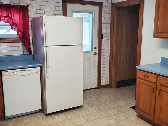 Entrance to lower level next to back door