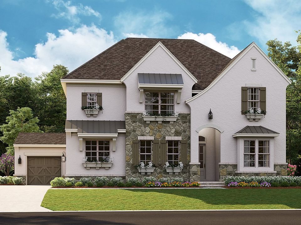 Newport II - French Cottage 3-Car Side Load Garage Note Renderings may show optional features