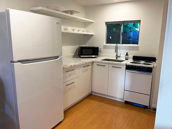 Kitchen with new appliances, cabinets, countertop