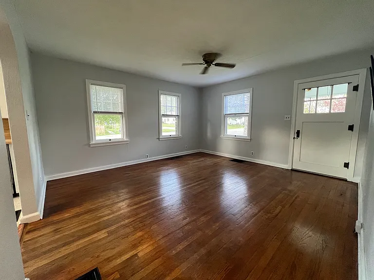 View from the hallway into the living room. Not pictured: new Google Nest smart thermostat in the hallway.