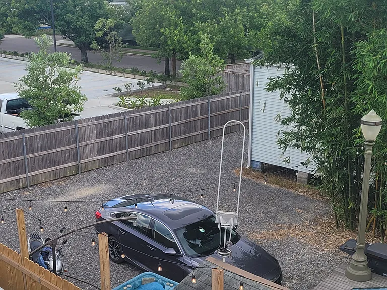 Gated Off Street Parking with
Entrance from Side Street