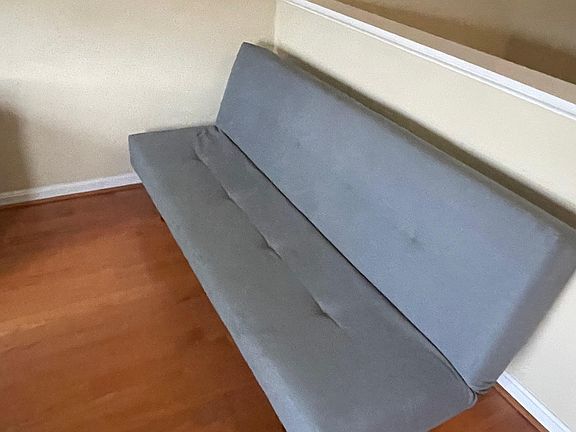 Futon on the 3rd floor just outside the open room.