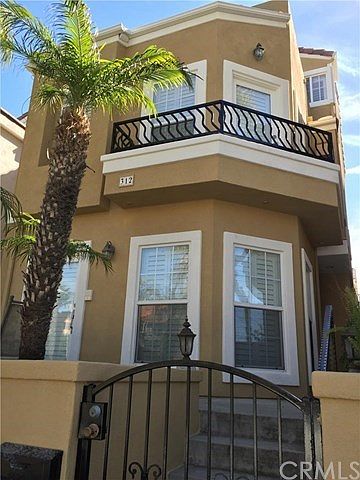 Front entrance of property with private raised front patio.