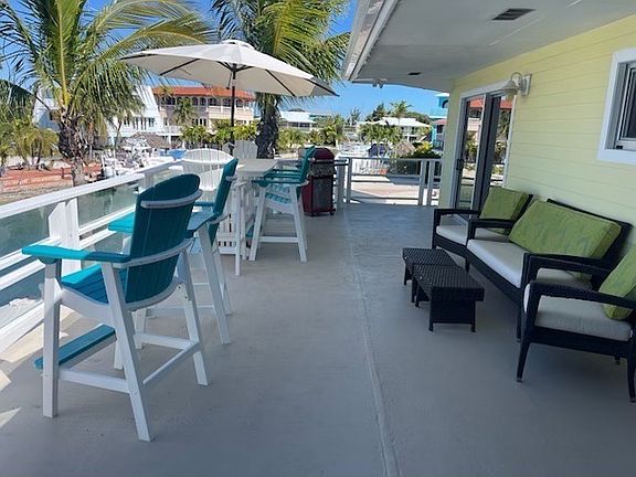 Lots of room for relaxing on the open air back deck. Enjoy grilling, the sunset or a good book!