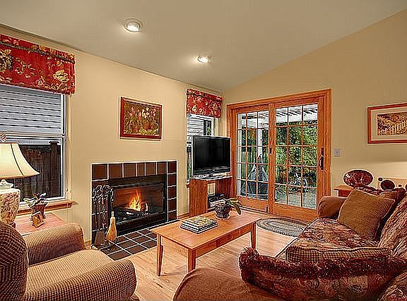 Family room off the kitchen with hardwood floors, new $4,000 Andersond door