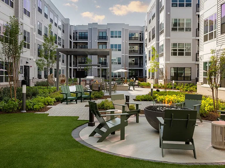 Courtyard with fireplace and lounge seating