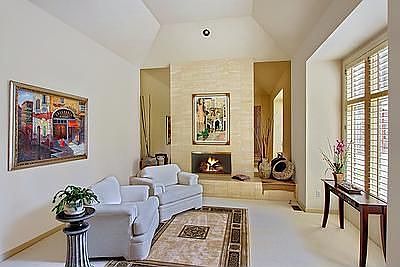 The step down formal living room is perfect for entertaining. Perfect size living room!
