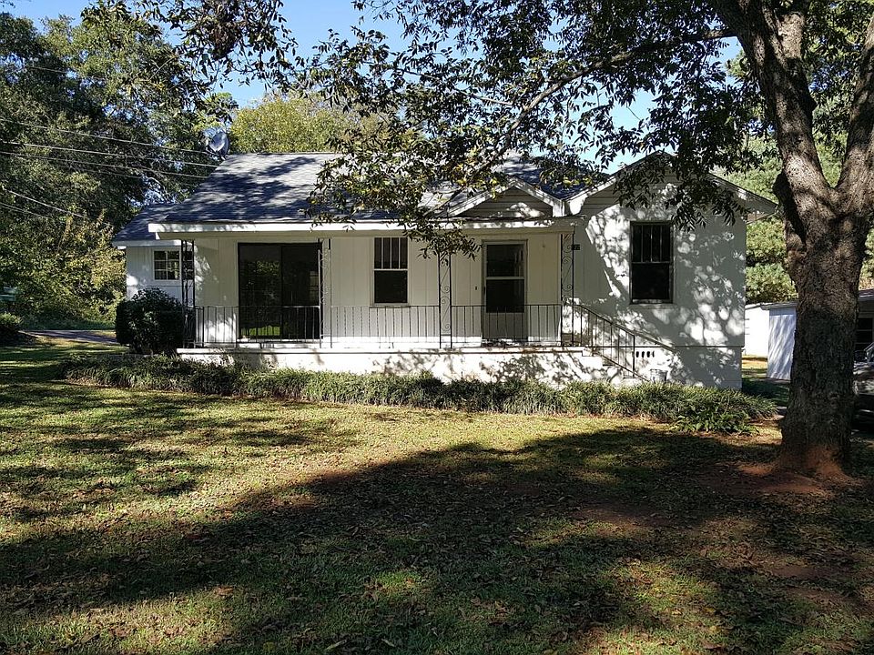 Front yard, full front porch, 2 mature pecan trees