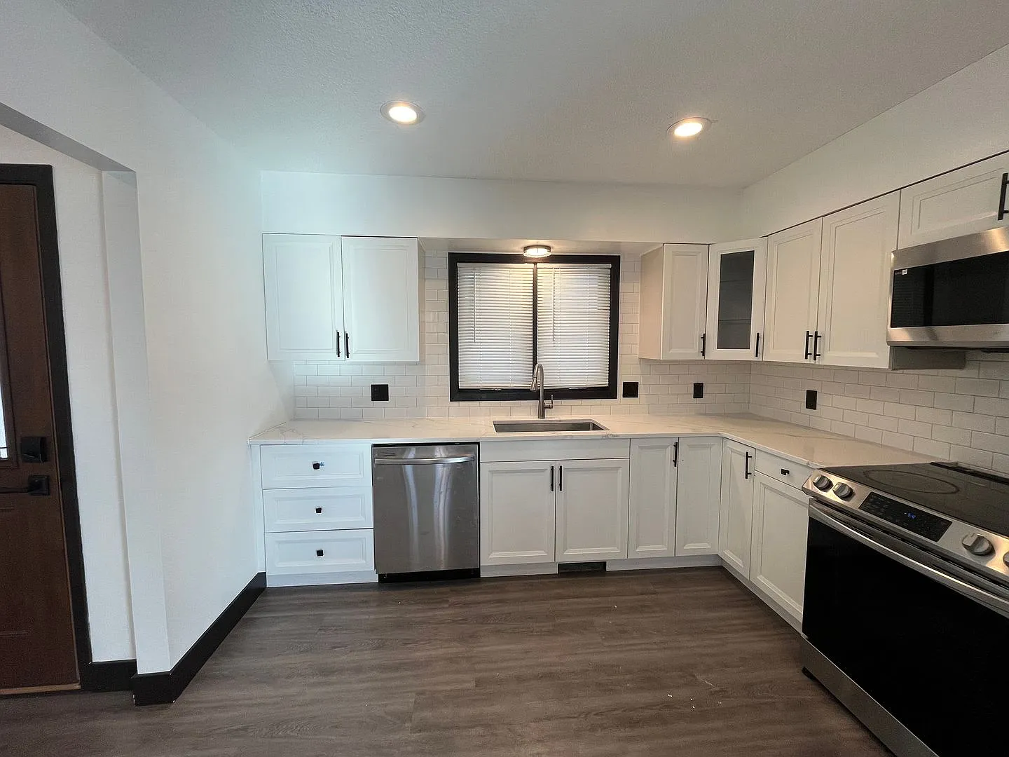 Updated Kitchen, carpet and freshly 3 bedroom / 2 bath home is right off Hwy 169 and Anderson Lak... — Photo 2