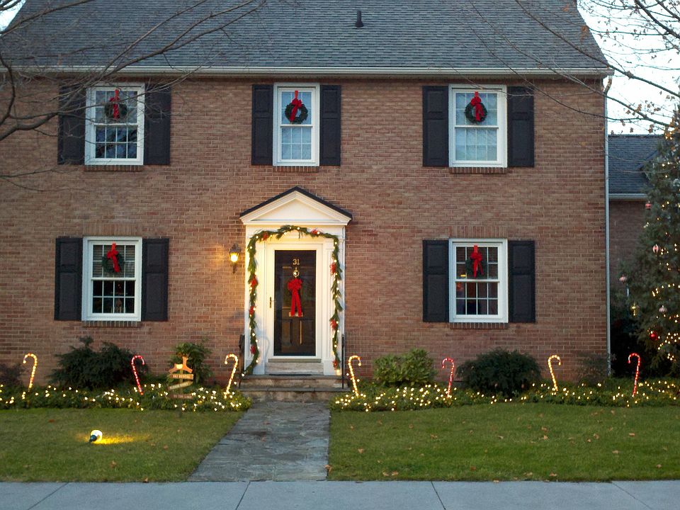Lovely brick colonial with low maintenance landscaping.