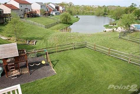 <b><em>BEAUTIFUL DISTANT VIEW OF POND FROM SAFE FENCED YARD!</B></EM>